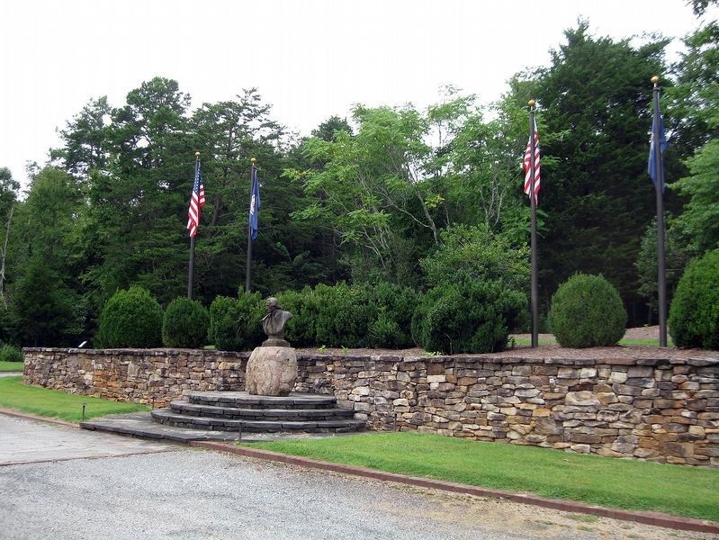 Commonwealth Courtyard with flags and a bust of Patrick Henry.. Click for full size. Commonwealth Courtyard with flags and a bust of Patrick Henry. image. Click for full size.