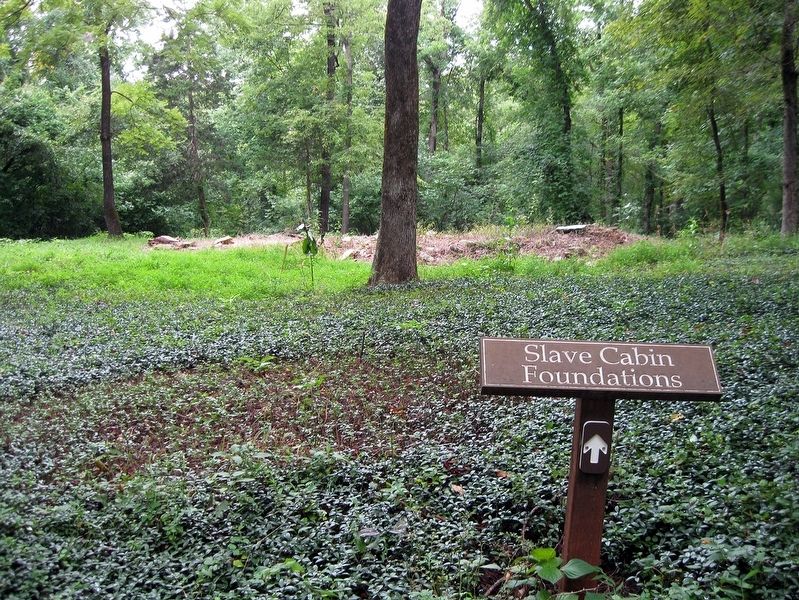 Slave Cabin Foundations & sign, which are along the Quarter Place Trail. Click for full size. Slave Cabin Foundations & sign, which are along the Quarter Place Trail image. Click for full size.