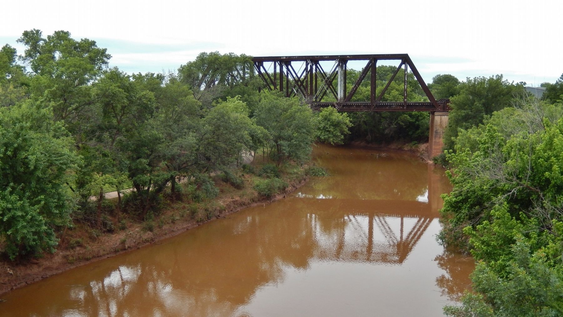 Wichita River and nearby active railroad trestle (<i>view north from bridge</i>) image. Click for full size.