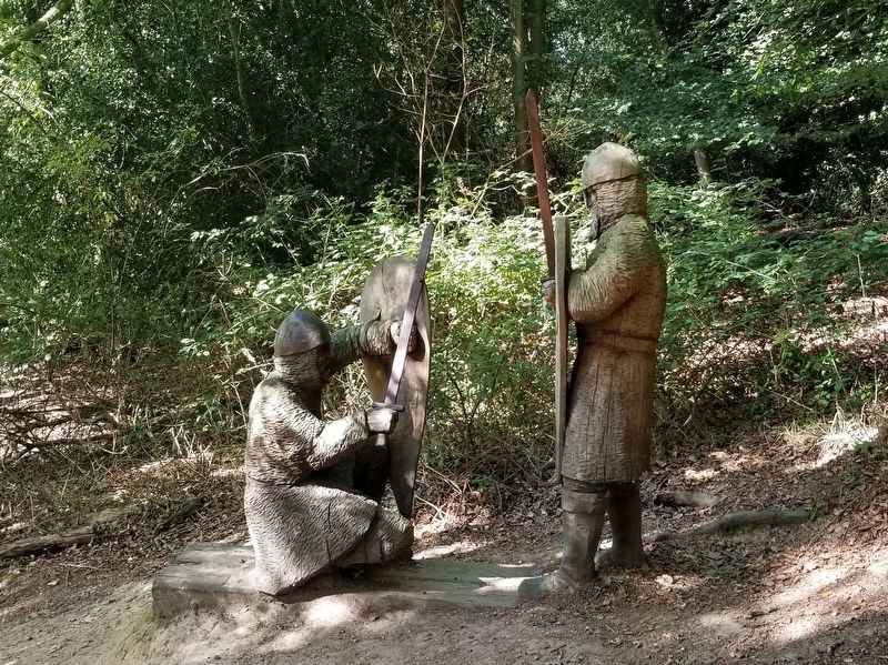 Wooden sculptures of soldiers on the battlefield path. Click for full size. Wooden sculptures of soldiers on the battlefield path image. Click for full size.