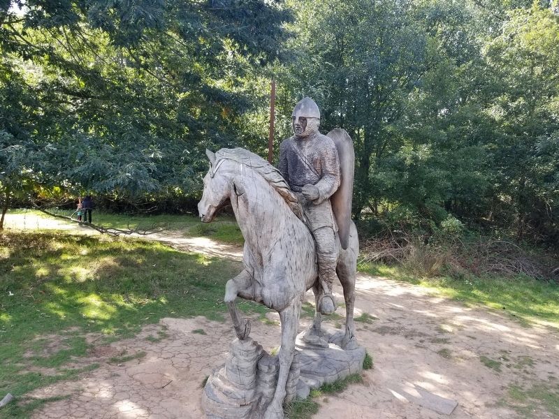 Wooden sculpture of a Norman Knight next to the marker. Click for full size. Wooden sculpture of a Norman Knight next to the marker image. Click for full size.