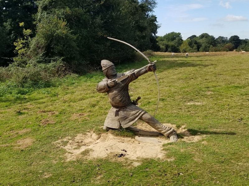 Wooden Sculpture of a Norman Archer near the Marker. Click for full size. Wooden Sculpture of a Norman Archer near the Marker image. Click for full size.