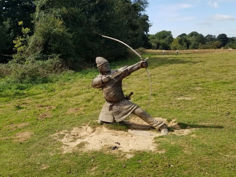 Wooden Sculpture of a Norman Archer near the Marker image. Click for full size.