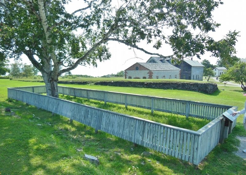 Railroad Grade Marker (<i>marker visible on right, against fence; railroad grade in background</i>) image. Click for full size.