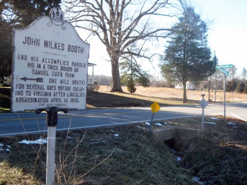 John Wilkes Booth Marker with intersection sign for Fairground Rd & Bel Alton Newtown Rd. image. Click for full size.