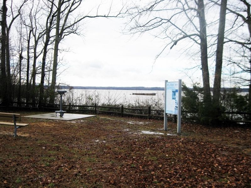 Mallows Bay Marker with shipwreck in distance. image. Click for full size.