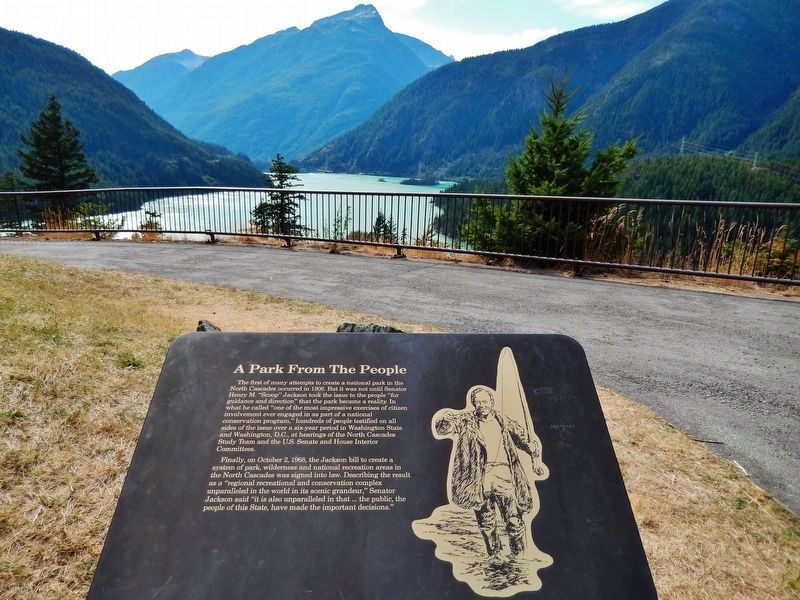 A Park From the People Marker (<i>wide view; looking west across Diablo Lake</i>). Click for full size. A Park From the People Marker (<i>wide view; looking west across Diablo Lake</i>) image. Click for full size.