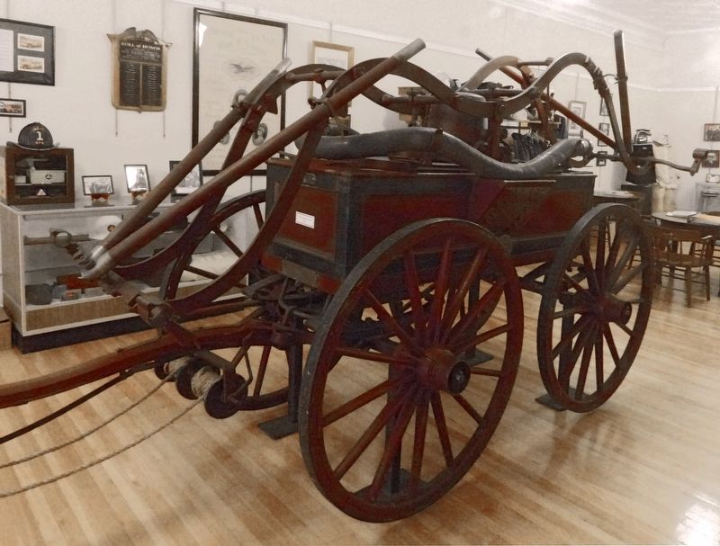 “Pet”<br>1828 John Rogers Co. end-stroke hand pumper image. Click for full size.