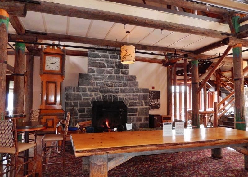 Paradise Inn Great Hall: Table, Grandfather Clock & Fireplace image. Click for full size.