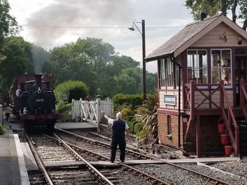 A Vintage Train approaches the Tenterden Town Signal Box. Click for full size. A Vintage Train approaches the Tenterden Town Signal Box image. Click for full size.