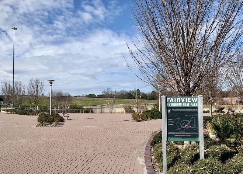 Entrance sign for Fairview Environmental Park with marker just to left of sign. image. Click for full size.