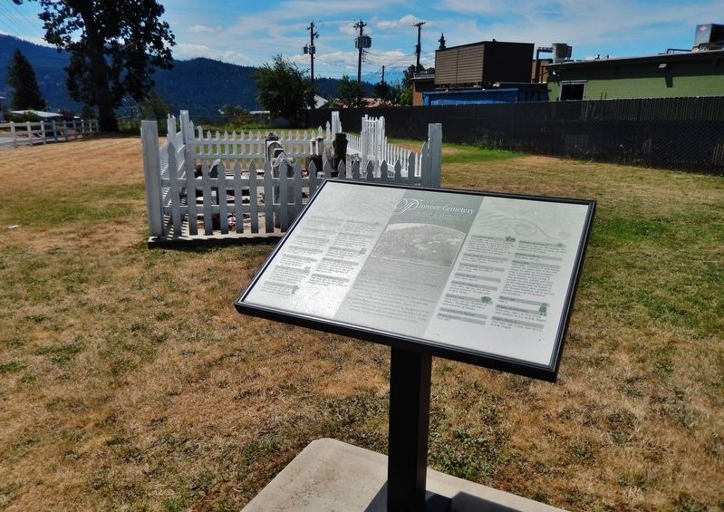 Pioneer Cemetery Marker (<i>wide view; cemetery plot in background</i>) image. Click for full size.
