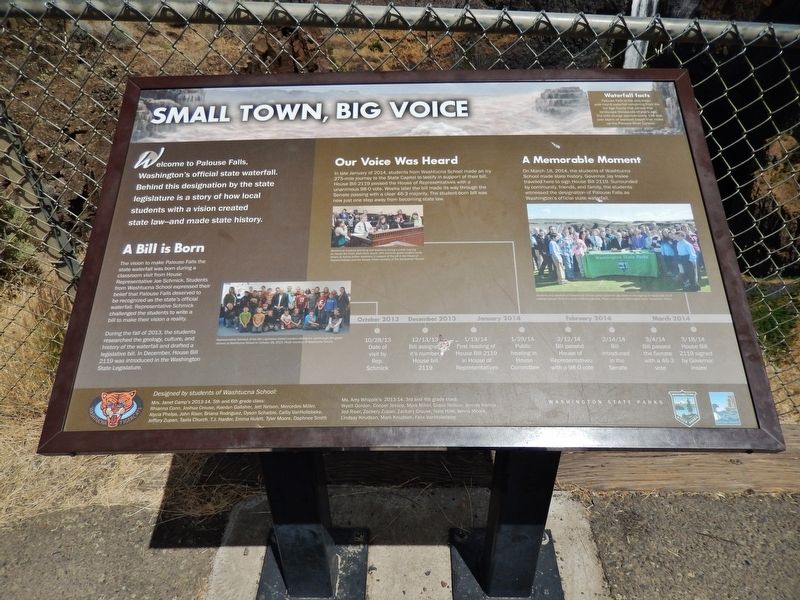 Small Town, Big Voice Marker (<i>tall view; Palouse falls in background behind fence</i>) image. Click for full size.