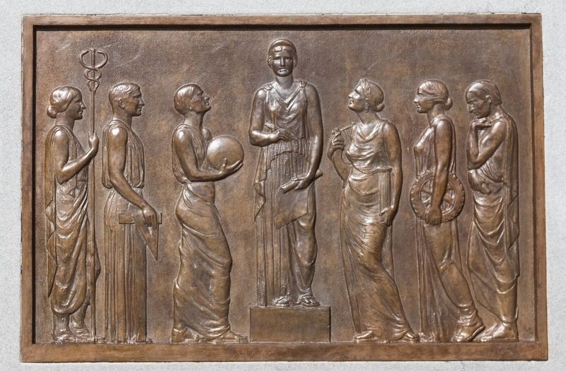 Bronze relief plaque on left of base image. Click for full size.