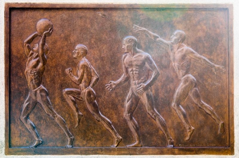 Bronze relief plaque on right of base image. Click for full size.