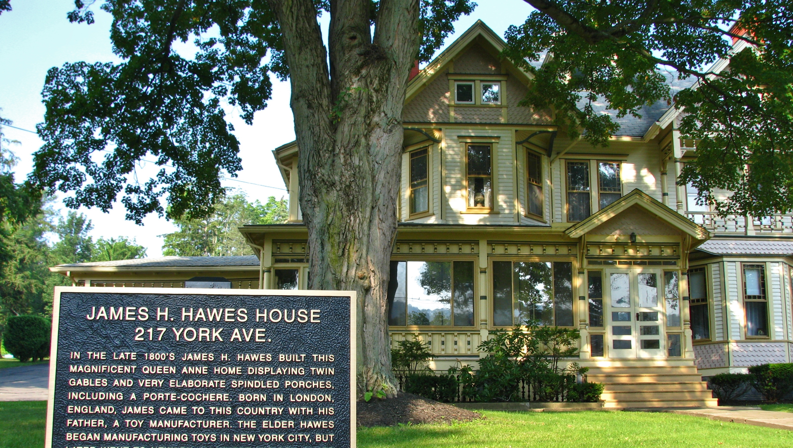 James H. Hawes House Marker (<i>wide view; front of house in background</i>)