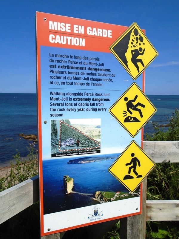 Percé Rock Caution Sign near Artistes Marker. Click for full size. Percé Rock Caution Sign near Artistes Marker image. Click for full size.