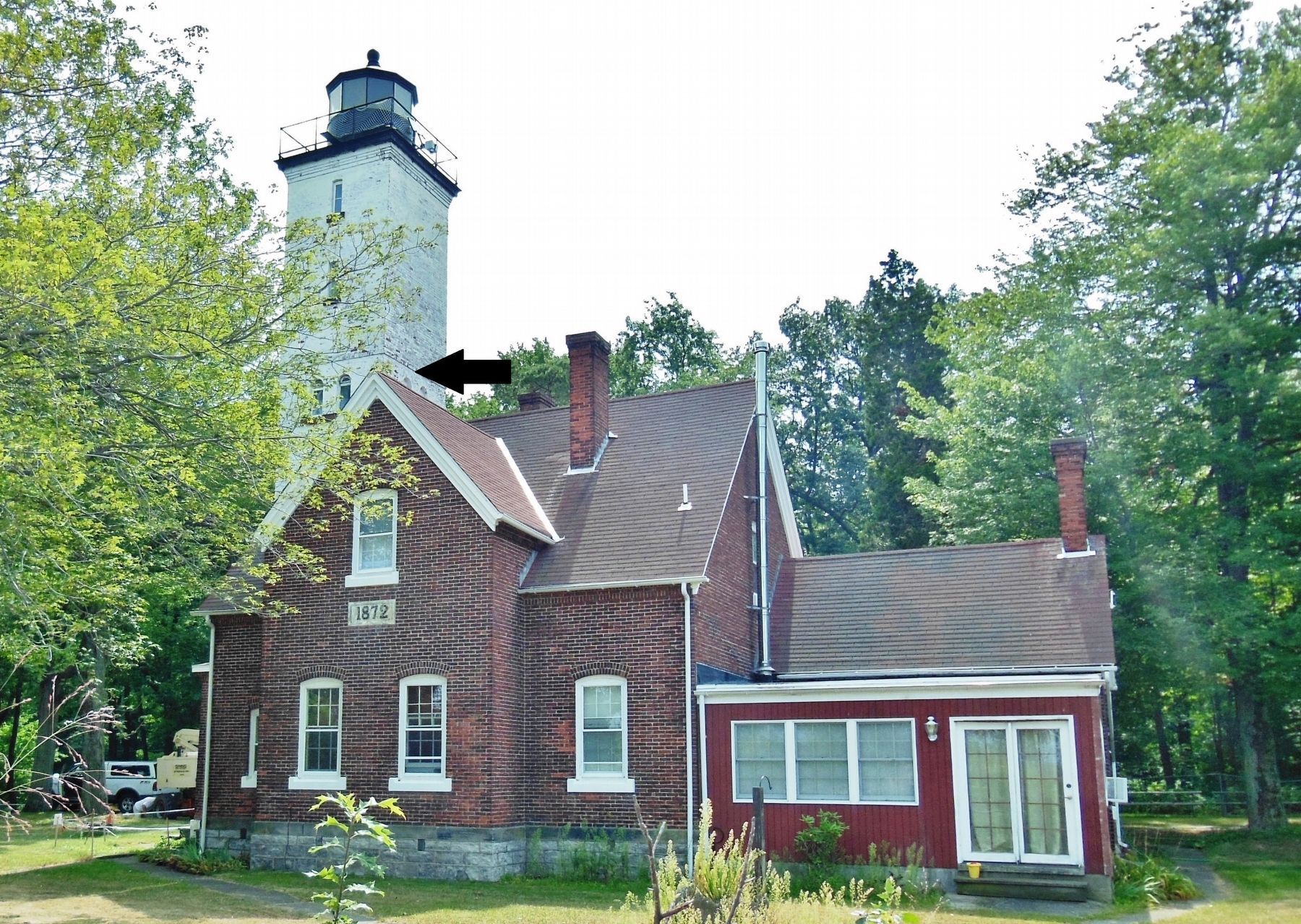Presque Isle Lighthouse (<i>1/10 mile northwest of marker; arrow at base of 1896 tower addition</i>) image. Click for full size.