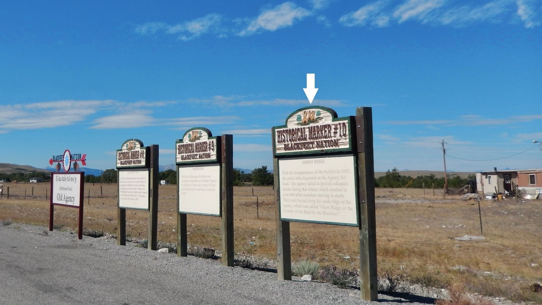 Ghost Ridge Marker (<i>wide view; rightmost of three historical markers at this site</i>) image. Click for full size.