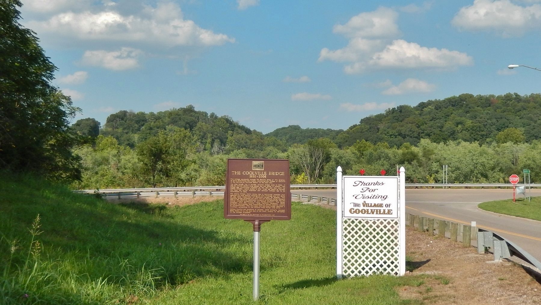 The Coolville Bridge Marker (<i>Ohio Route 144 and site of former bridge in background</i>) image. Click for full size.