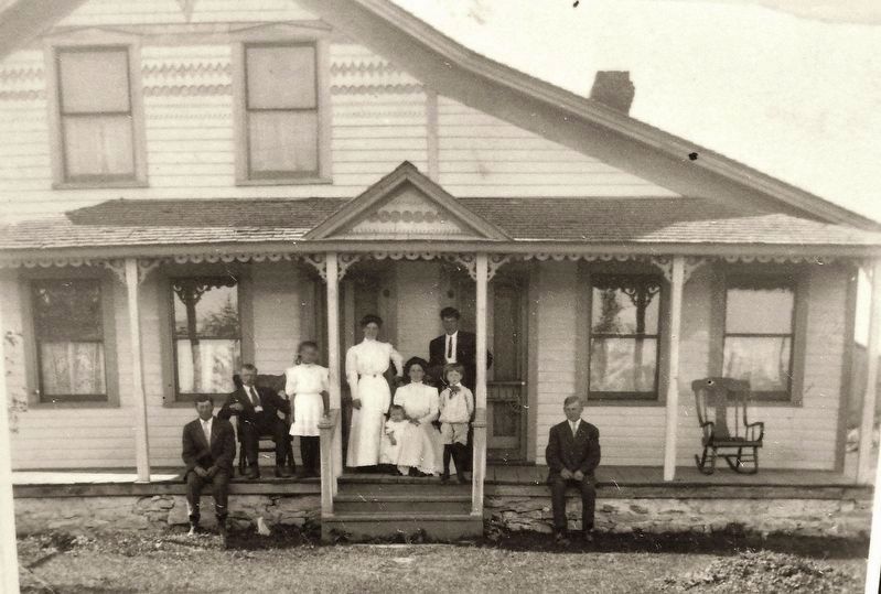 Marker detail: The August Johnson family in the first frame house in Ellison Bay image. Click for full size.