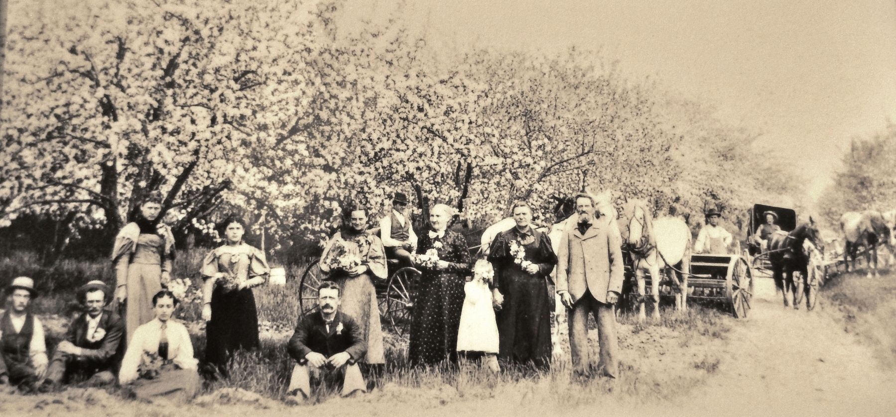 Marker detail: Joseph Zettel (foreground, right) and family display their renowned orchard, c. 1900. Click for full size. Marker detail: Joseph Zettel (foreground, right) and family display their renowned orchard, c. 1900 image. Click for full size.