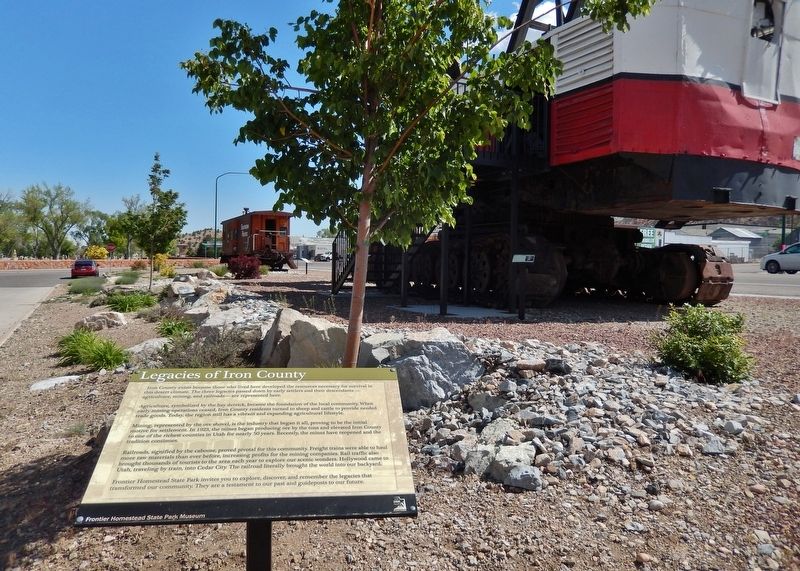 Legacies of Iron County Marker (<i>wide view; Ore Shovel exhibit in background</i>) image. Click for full size.