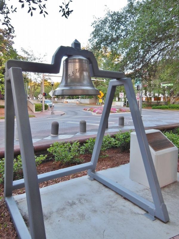 USS Tallahassee Marker (<i>wide view; marker mounted knee-level on pedestal beside bell exhibit</i>) image. Click for full size.