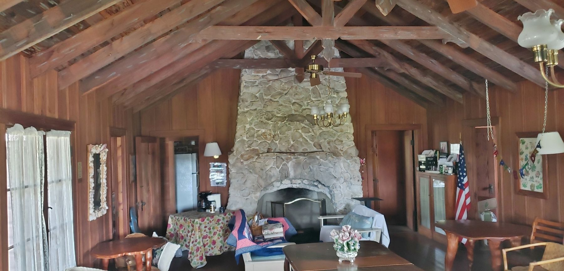 Garden Center Interior (<i>stone fireplace; cypress furniture, walls and rafters</i>) image. Click for full size.