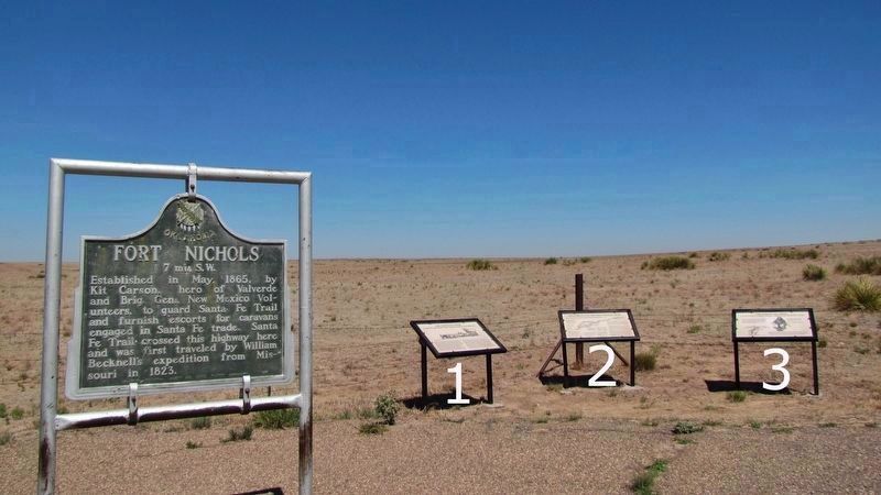 Three Santa Fe Trail Marker Panels (<i>Fort Nichols marker left; Santa Fe Trail in background</i>). Click for full size. Three Santa Fe Trail Marker Panels (<i>Fort Nichols marker left; Santa Fe Trail in background</i>) image. Click for full size.