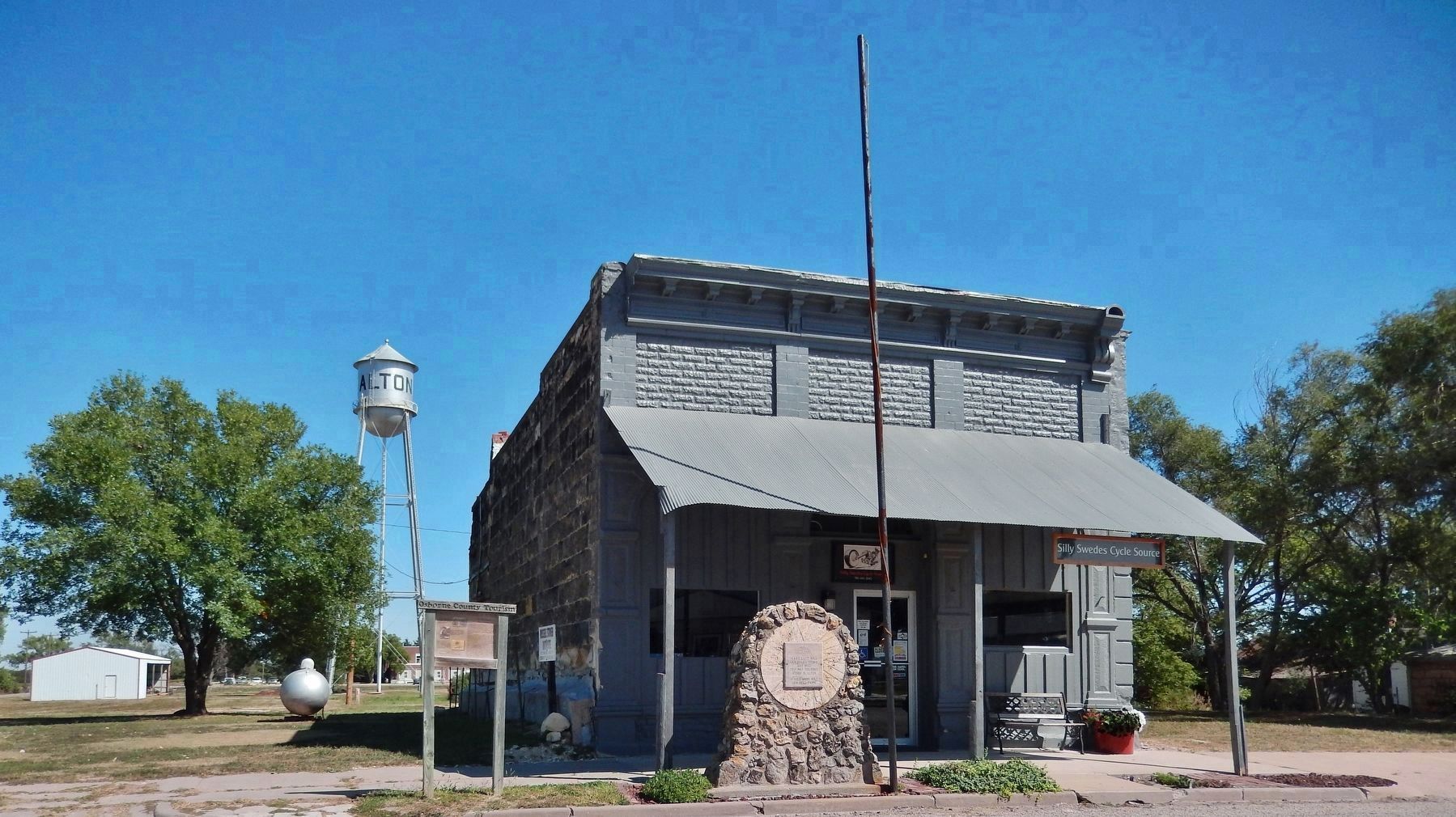 The Founding of Alton, Kansas Marker (<i>wide view; marker left; Bull's Store plaque at center</i>) image. Click for full size.