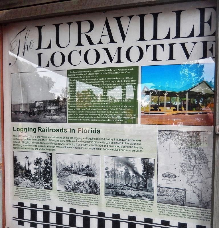 The Luraville Locomotive Marker (<i>left panel</i>)<br>• Logging Railroads in America • image, Touch for more information