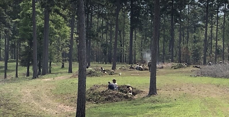 April 2019 reenactment with Confederate soldiers in rifle pits. image. Click for full size.