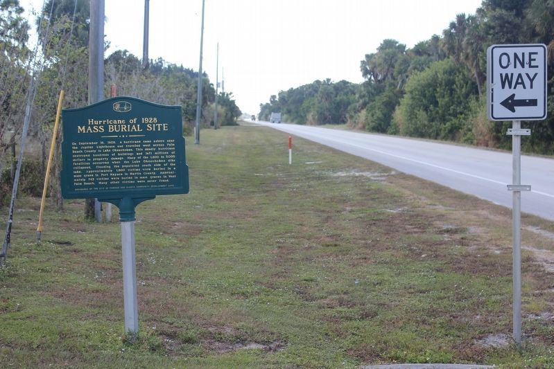 Hurricane of 1928 Mass Burial Site Marker at cemetery entrance image. Click for full size.