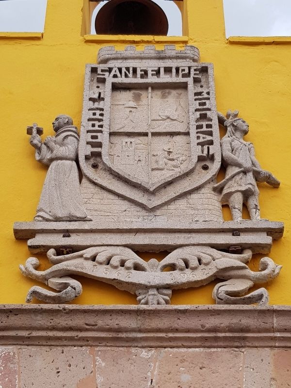 The San Felipe coat of arms over the main doorway image. Click for full size.