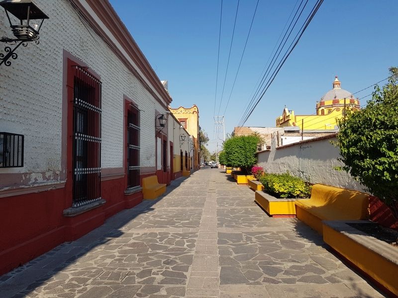 Looking east on Calle Primavera towards the Plaza and Temple of San Sebastin image. Click for full size.