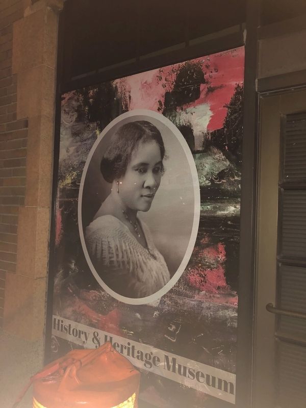 Image of Madame C.J. Walker on the side of the Museum image. Click for full size.