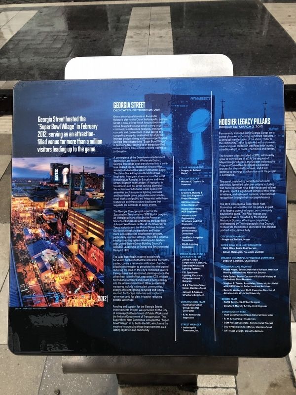 Additional sign nearby describing the revitalizing of the Wholesale District for the 2012 Superbowl image. Click for full size.
