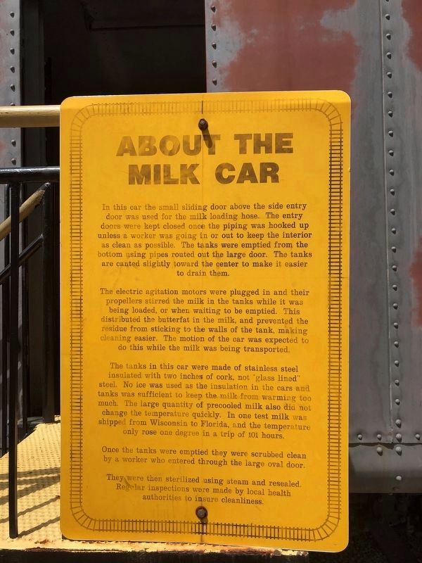 Additional plaque on the other side of the train car image. Click for full size.