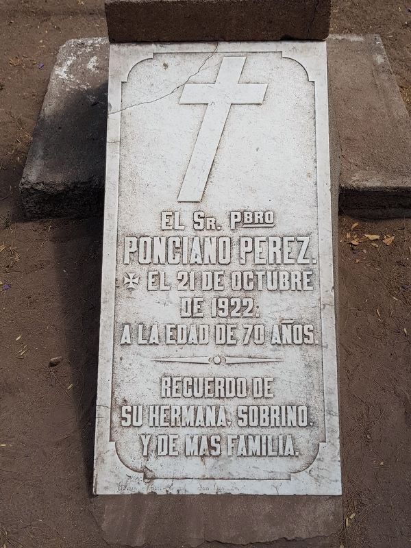 The nearby grave of Father Ponciano Pérez from 1922, a supporter of land restitution image. Click for full size.