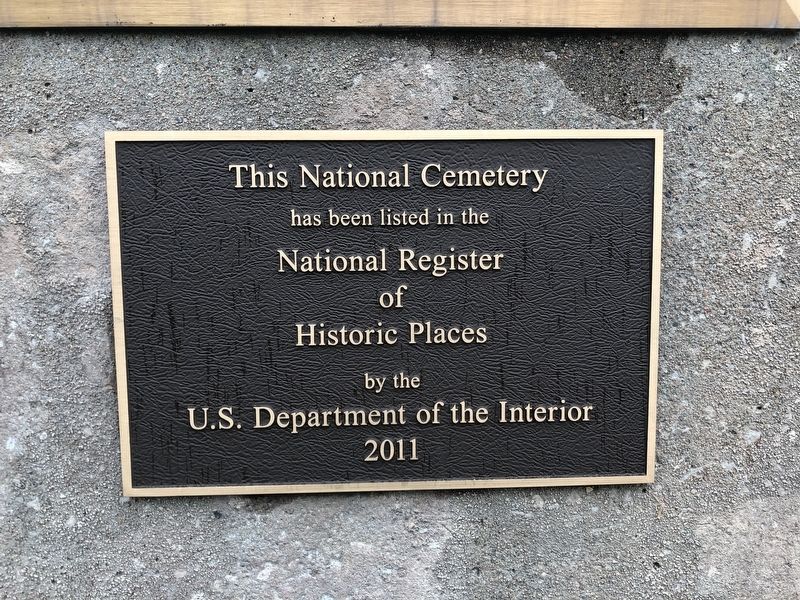 National Register of Historic Places plaque on the ground of the cemetery image. Click for full size.