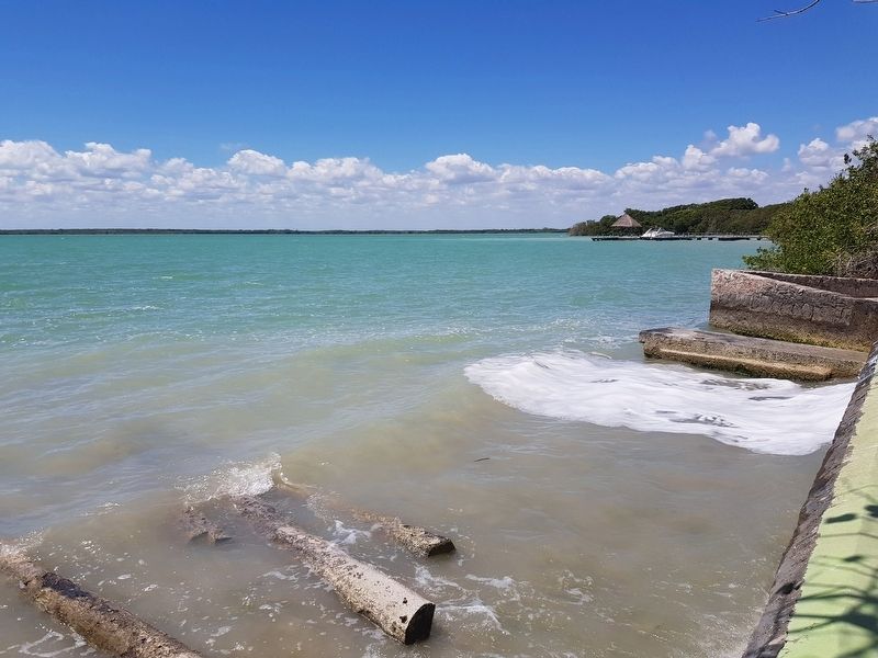 A view of the Chetumal Bay south of the marker, with the mouth of Río Hondo towards the right image. Click for full size.