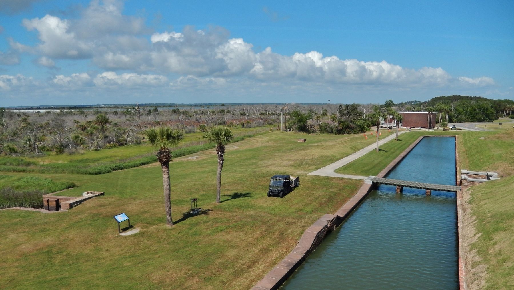 Moat Feeder Canal, Marker & Moat (<i>view looking southwest from atop fort rampart</i>). Click for full size. Moat Feeder Canal, Marker & Moat (<i>view looking southwest from atop fort rampart</i>) image. Click for full size.