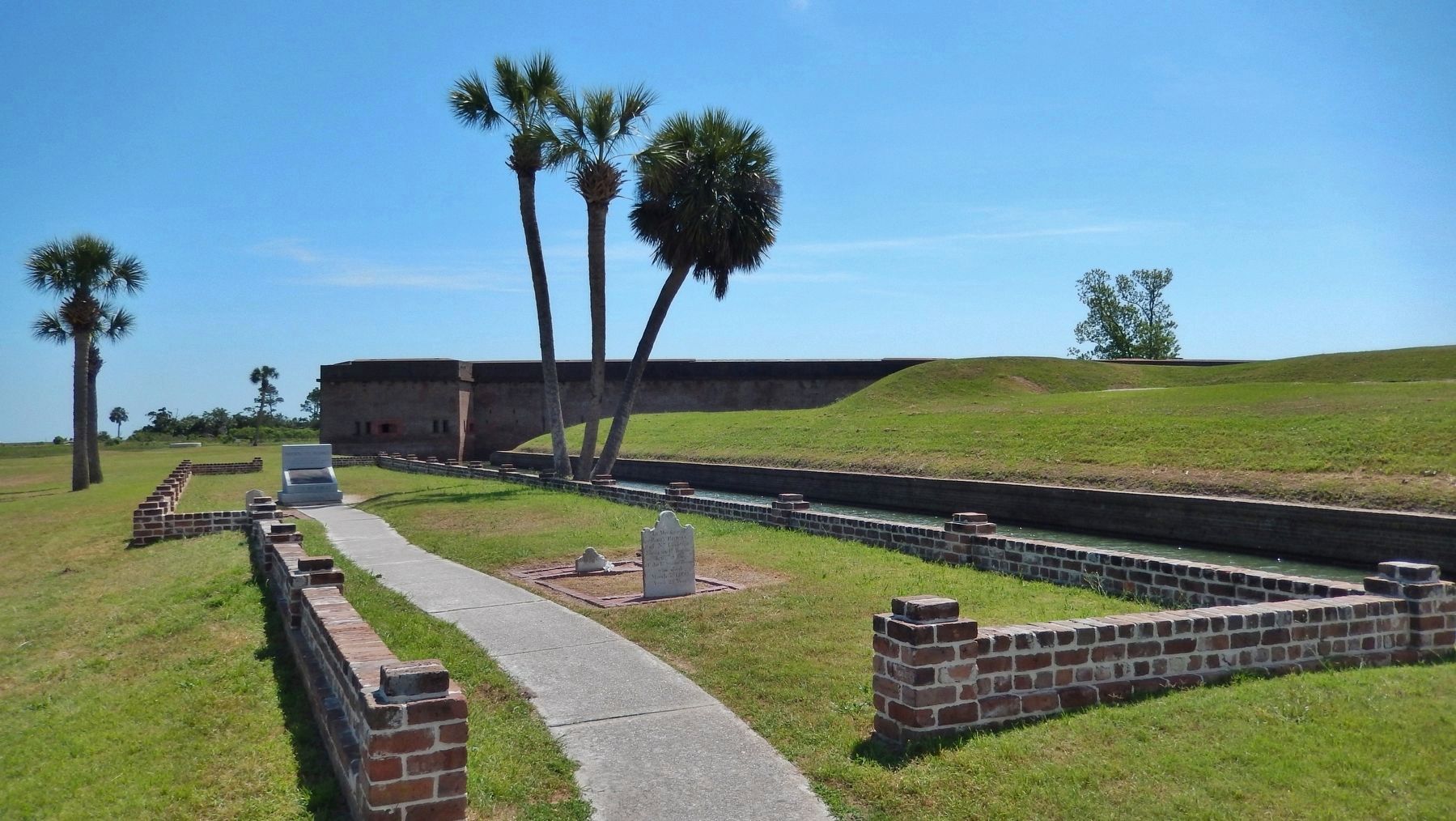 Fort Pulaski Cemetery (<i>view from near marker • Fort Pulaski in background</i>) image. Click for full size.