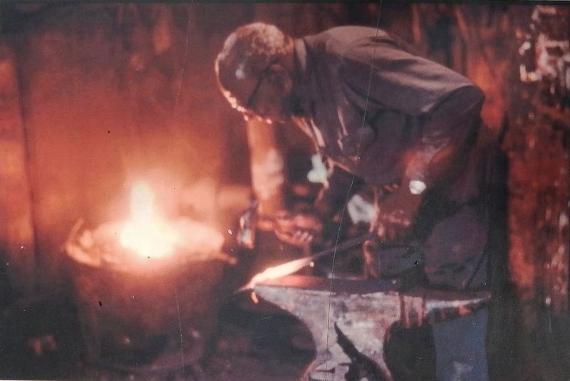 Marker detail: Philip Simmons at work<br>(Photograph by John Michael Vlach) image. Click for full size.