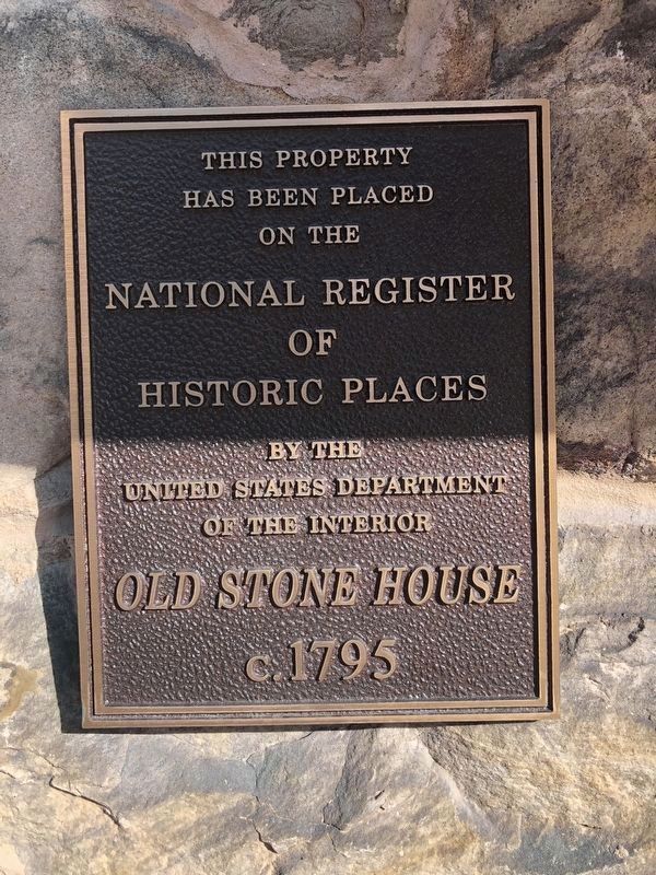 National Register plaque on the building image. Click for full size.