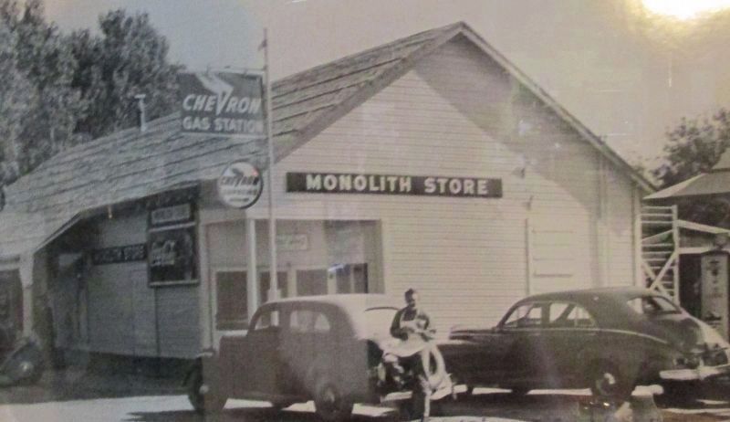 Monolith Store, cafe, and Post Office with Curtis Reed in background and Maucey Shinners in front. image. Click for full size.