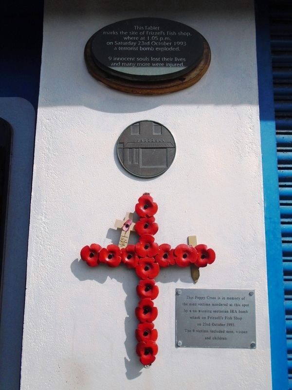 Frizzell's Fish Shop Bombing Victims Markers and Poppy Cross image. Click for full size.