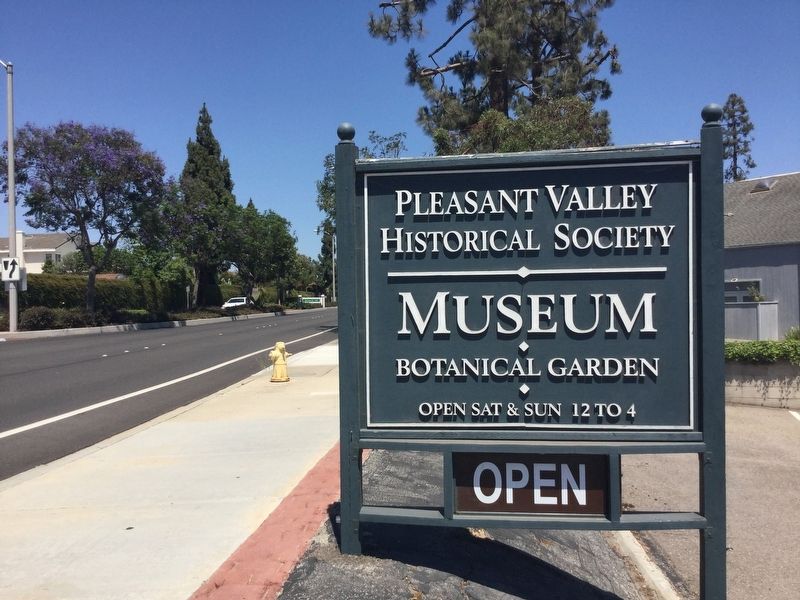 Sign in front of museum image. Click for full size.