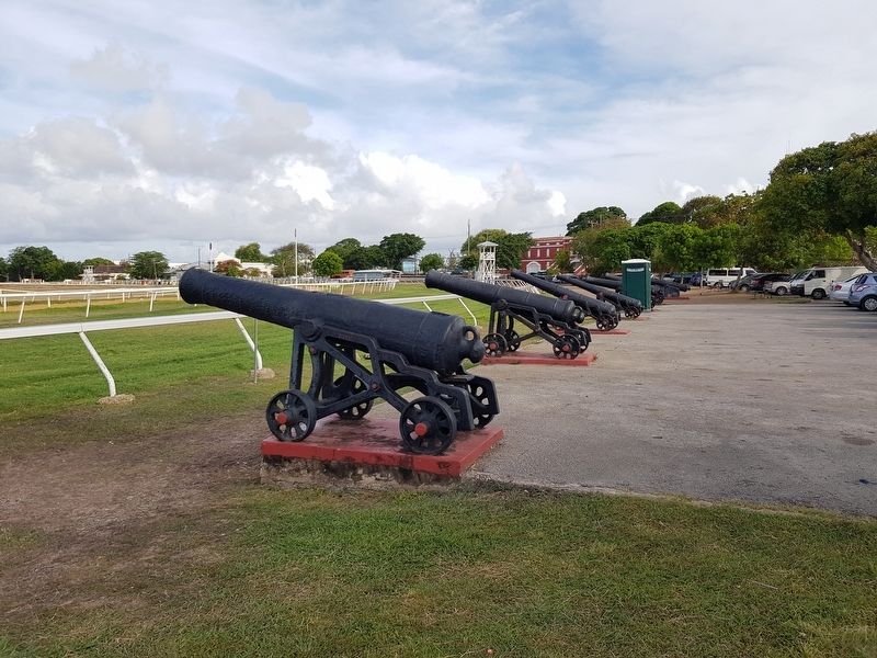 Collection of colonial-era cannon in front of The Main Guard image. Click for full size.